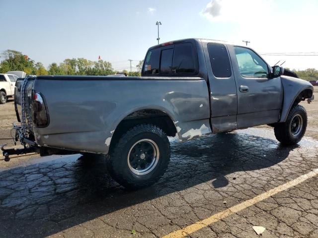 2FTRX18L9XCB20714 - 1999 FORD F150 Серый фото 3