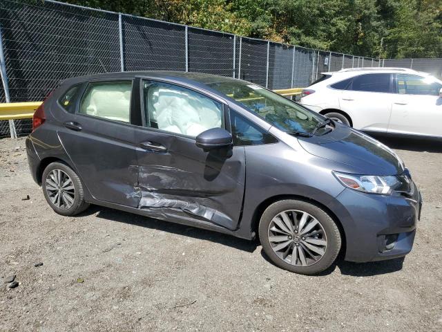JHMGK5H72GX032908 - 2016 HONDA FIT EX GRAY photo 4