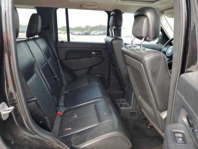 1C4PJMAK5CW214499 - 2012 JEEP LIBERTY SPORT BLACK photo 11