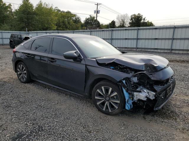 19XFL1H72PE017280 - 2023 HONDA CIVIC EXL შავი ფოტო 4