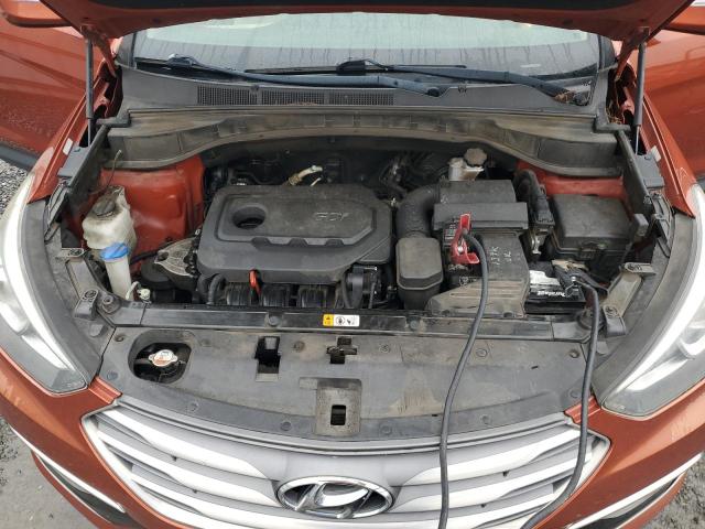 5XYZU3LB2JG522764 - 2018 HYUNDAI SANTA FE S ORANGE photo 11