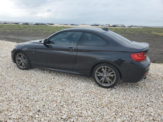 WBA1J7C57EVW84702 - 2014 BMW M235I BLACK photo 2