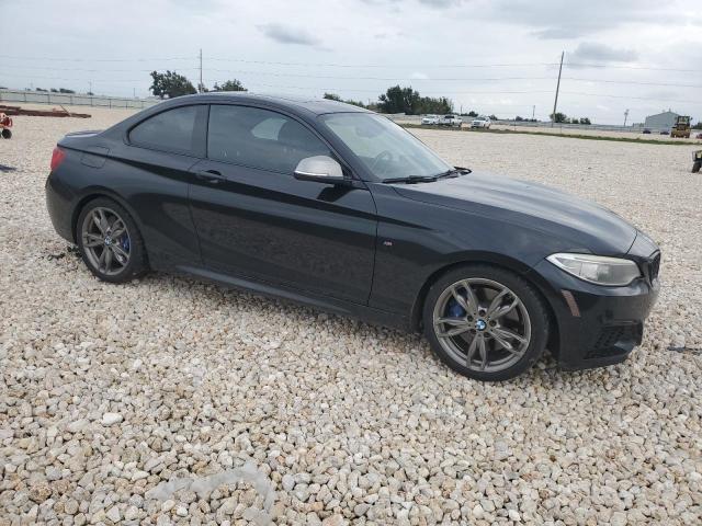 WBA1J7C57EVW84702 - 2014 BMW M235I BLACK photo 4