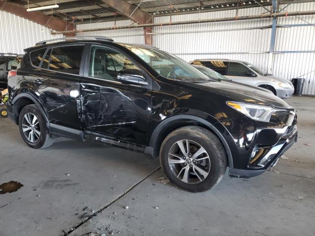 2T3WFREV7HW362514 - 2017 TOYOTA RAV4 XLE BLACK photo 4