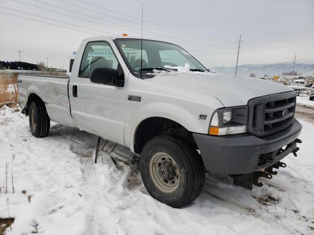 1FTSF31S92EB59582 - 2002 FORD F350 SRW SUPER DUTY SILVER photo 4