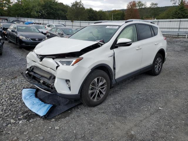 JTMRJREV1GD041026 - 2016 TOYOTA RAV4 HV XLE WHITE photo 1