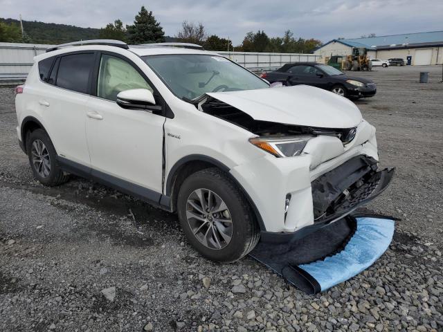 JTMRJREV1GD041026 - 2016 TOYOTA RAV4 HV XLE WHITE photo 4