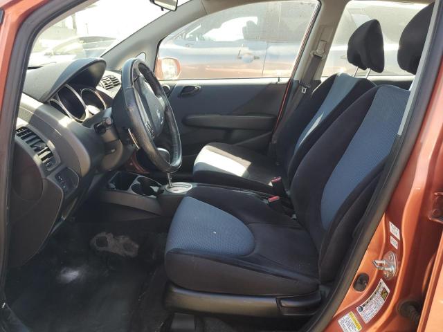 JHMGD38628S064682 - 2008 HONDA FIT SPORT ORANGE photo 7