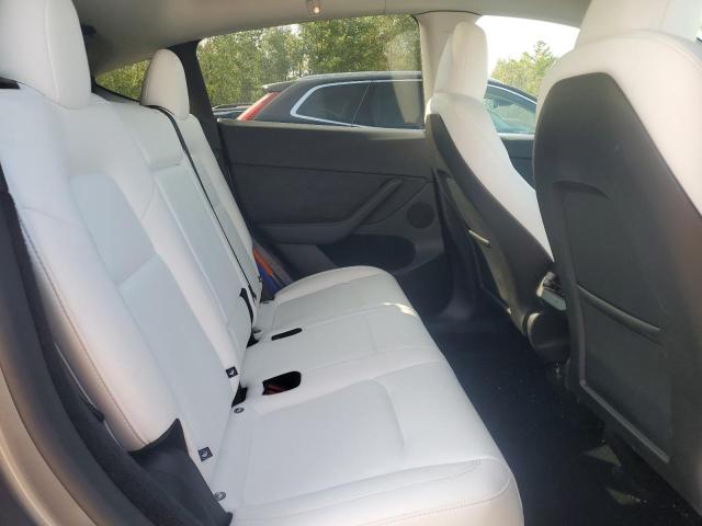 7SAYGDEE4RF210497 - 2024 TESLA MODEL Y ვერცხლისფერი ფოტო 10