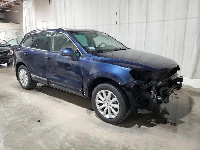 WVGEF9BP1CD010287 - 2012 VOLKSWAGEN TOUAREG V6 BLUE photo 4