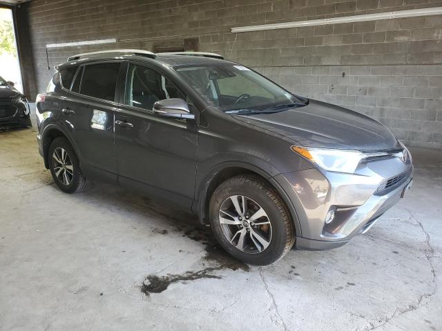 JTMRFREV5HD201931 - 2017 TOYOTA RAV4 XLE GRAY photo 4