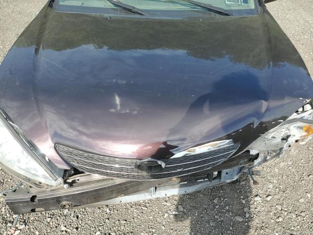 JTDBF30KX20033245 - 2002 TOYOTA CAMRY LE BLACK photo 11