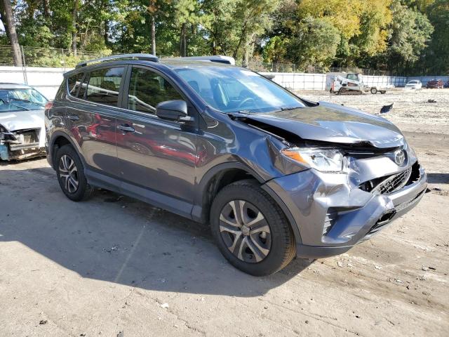 2T3ZFREV8JW503707 - 2018 TOYOTA RAV4 LE GRAY photo 4