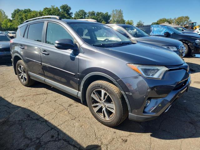 JTMRFREV9HD209322 - 2017 TOYOTA RAV4 XLE GRAY photo 4