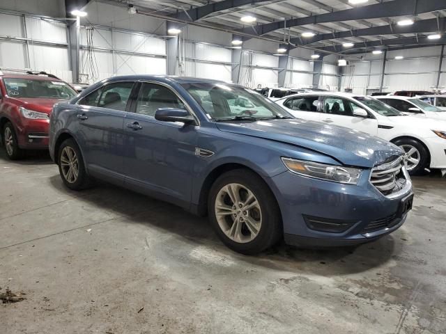 1FAHP2E82JG134984 - 2018 FORD TAURUS SEL BLUE photo 4