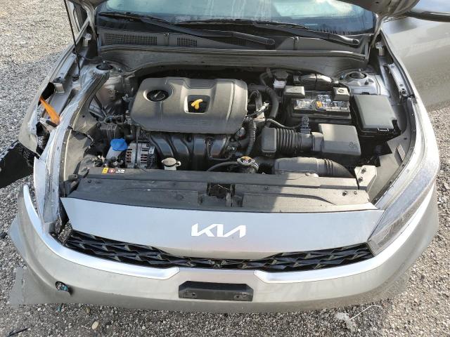3KPF34AD9PE594289 - 2023 KIA FORTE EX SILVER photo 11