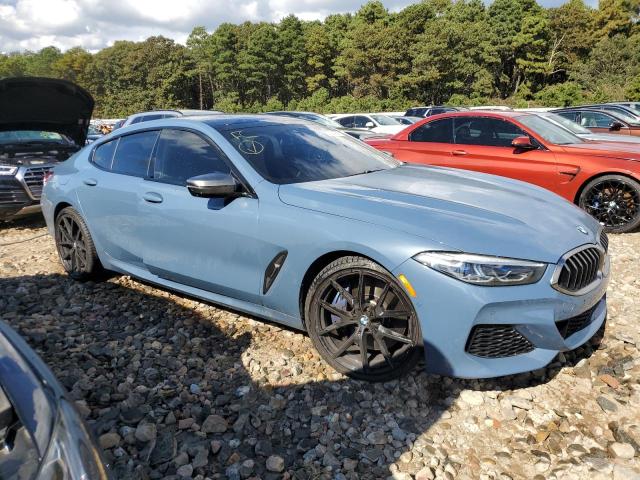 WBAGV8C02NCJ95869 - 2022 BMW M850XI BLUE photo 4