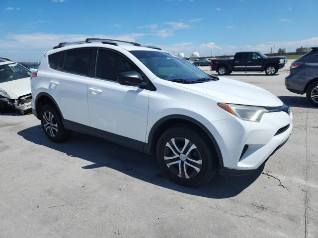 2T3BFREVXGW527114 - 2016 TOYOTA RAV4 LE WHITE photo 4