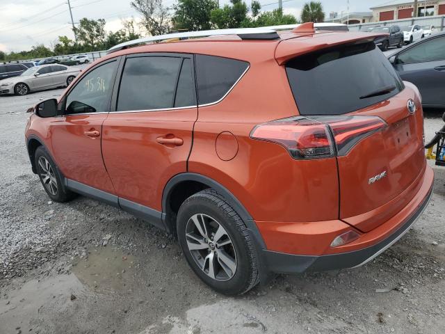 2T3WFREV6GW280367 - 2016 TOYOTA RAV4 XLE ORANGE photo 2