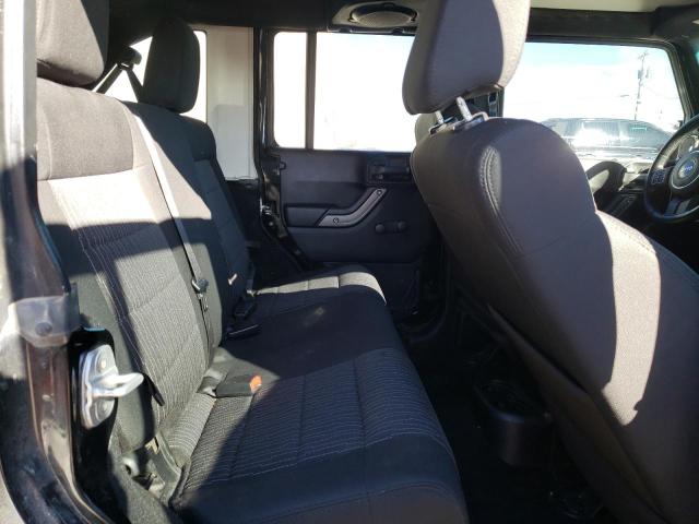 1C4BJWDG9CL142625 - 2012 JEEP WRANGLER U SPORT Schwarz Foto 10