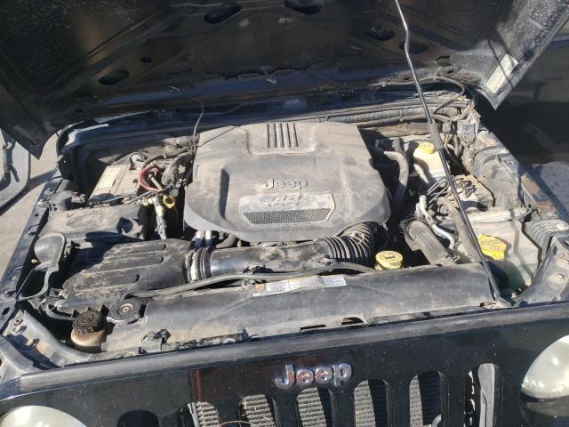 1C4BJWDG9CL142625 - 2012 JEEP WRANGLER U SPORT Schwarz Foto 11