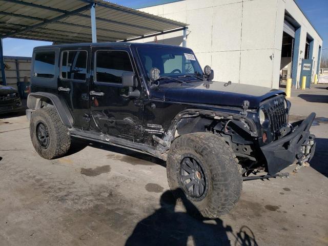 1C4BJWDG9CL142625 - 2012 JEEP WRANGLER U SPORT Schwarz Foto 4