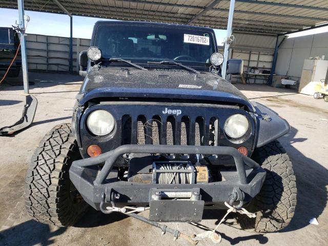 1C4BJWDG9CL142625 - 2012 JEEP WRANGLER U SPORT Schwarz Foto 5