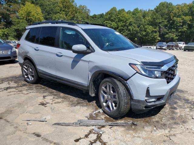 5FNYF7H51NB000513 - 2022 HONDA PASSPORT EXL BLUE photo 4