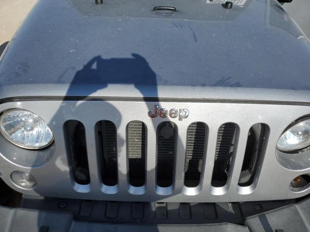 1C4AJWAG2FL746232 - 2015 JEEP WRANGLER SPORT SILVER photo 11