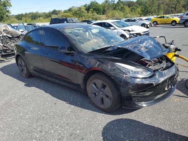 5YJ3E1EA7PF459494 - 2023 TESLA MODEL 3 BLACK photo 4