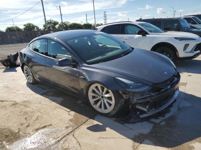 5YJ3E1EA7PF438029 - 2023 TESLA MODEL 3 Серый фото 4