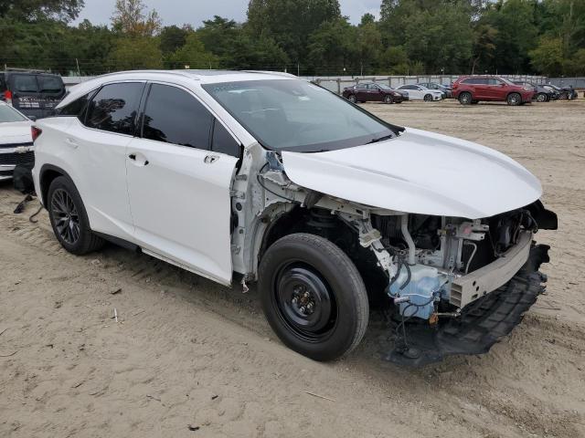 2T2BZMCA5HC060251 - 2017 LEXUS RX 350 BASE WHITE photo 4