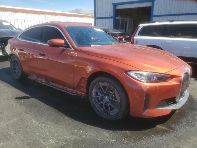 WBY43AW02PFP81342 - 2023 BMW I4 EDRIVE 35 ORANGE photo 4