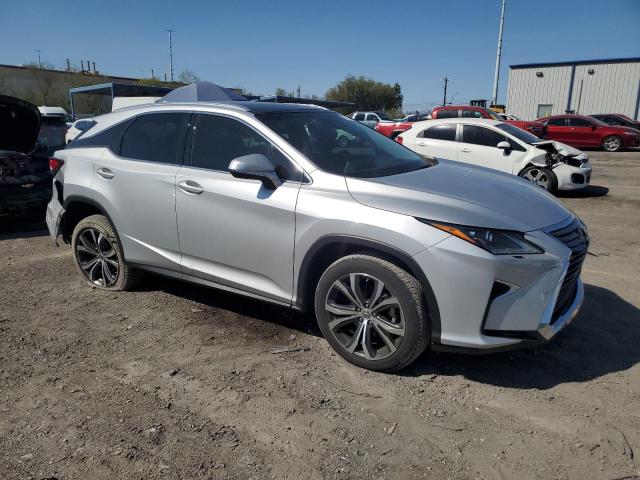 2T2BZMCA7HC116934 - 2017 LEXUS RX 350 BASE SILVER photo 4