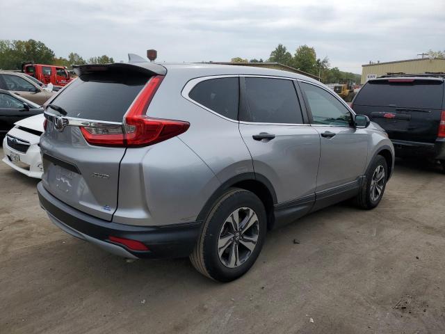 2HKRW6H34JH223914 - 2018 HONDA CR-V LX SILVER photo 3