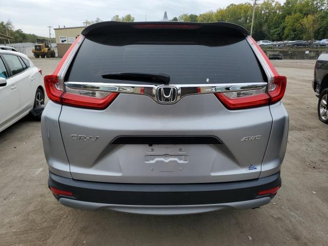 2HKRW6H34JH223914 - 2018 HONDA CR-V LX SILVER photo 6