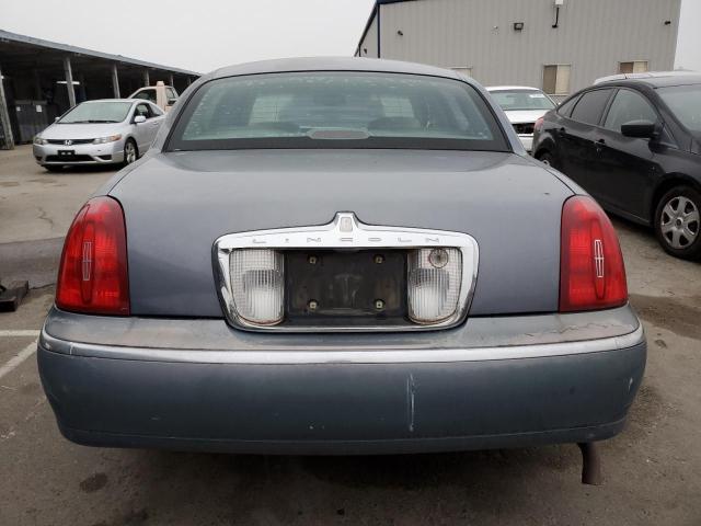 1LNHM82W4XY663005 - 1999 LINCOLN TOWN CAR SIGNATURE BLUE photo 6