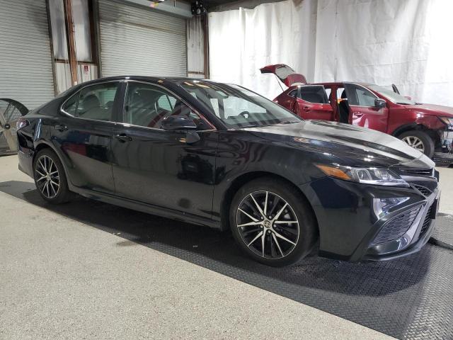4T1G11BK6RU119690 - 2024 TOYOTA CAMRY SE NIGHT SHADE BLACK photo 4
