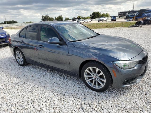 WBA8E1G55HNU12504 - 2017 BMW 320 I SILVER photo 4