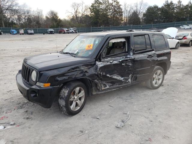 1C4NJPCB9ED508623 - 2014 JEEP PATRIOT LIMITED BLACK photo 1