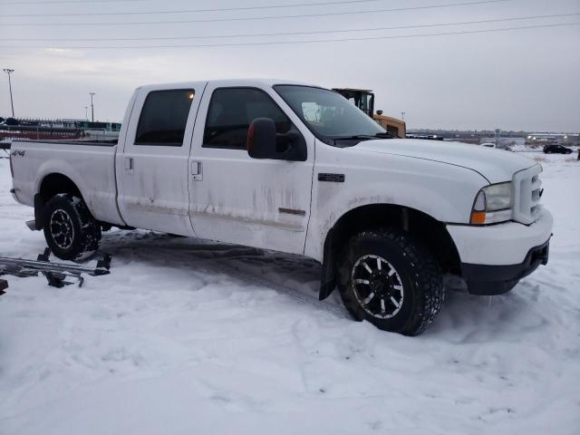 1FTSW31P64EB16719 - 2004 FORD F350 SRW SUPER DUTY WHITE photo 4