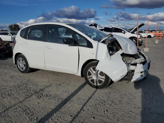 JHMGE8H25AS000231 - 2010 HONDA FIT WHITE photo 4