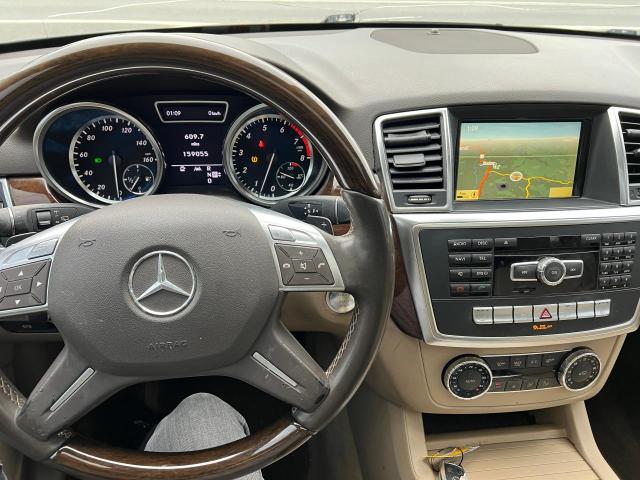 4JGDA5HB0CA036475 - 2012 MERCEDES-BENZ ML 350 4MATIC GRAY photo 7