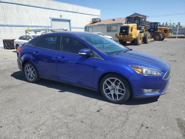 1FADP3F26FL306513 - 2015 FORD FOCUS SE BLUE photo 4