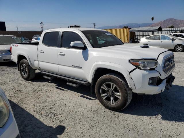 3TMDZ5BN7GM009931 - 2016 TOYOTA TACOMA DOUBLE CAB WHITE photo 4