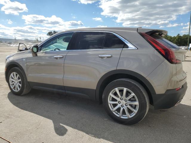 1GYAZAR48PF225452 - 2023 CADILLAC XT4 LUXURY GOLD photo 2