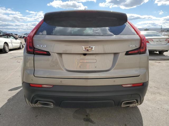 1GYAZAR48PF225452 - 2023 CADILLAC XT4 LUXURY GOLD photo 6