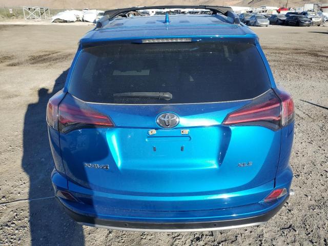 JTMWFREV7JJ162012 - 2018 TOYOTA RAV4 ADVENTURE BLUE photo 6