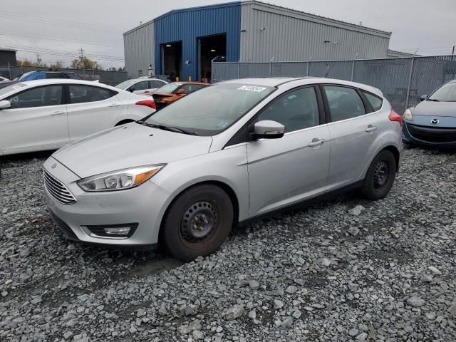 1FADP3N23HL326142 - 2017 FORD FOCUS TITANIUM SILVER photo 1