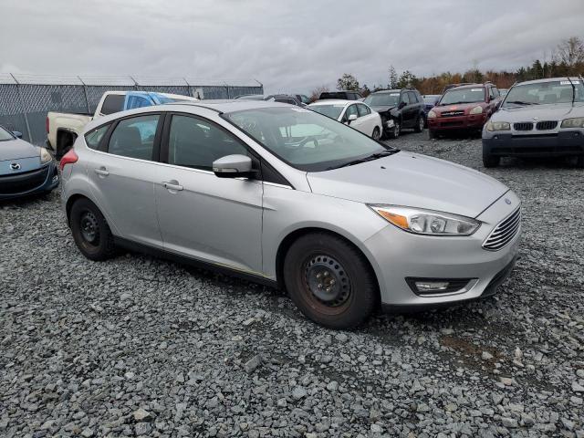 1FADP3N23HL326142 - 2017 FORD FOCUS TITANIUM SILVER photo 4